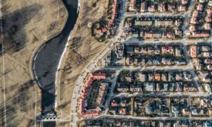 Aerial view of a residential neighborhood showing streets, homes, and lot layouts, illustrating how a subdivision is planned and organized